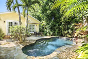 Mango Haus - Savor Tropical Living by a Lush Lagoon Pool
