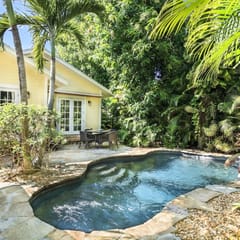 Mango Haus - Savor Tropical Living by a Lush Lagoon Pool