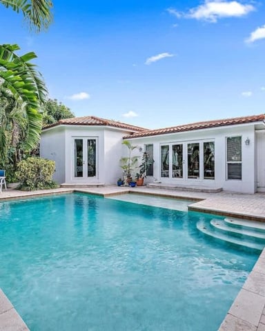 Private pool and patio at a Palm Beach vacation rental home
