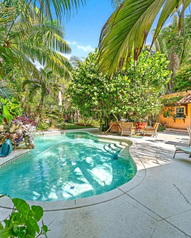 Shared pool area at a Palm Beach vacation rental community