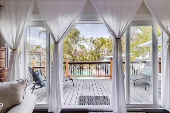 The Periwinkle House – Bask Poolside at this Sunlit West Palm Retreat - Image 4