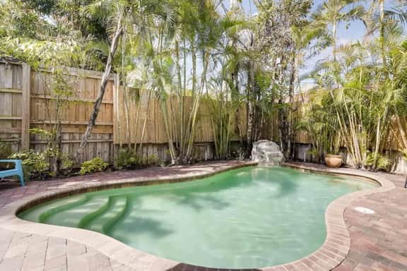 The Periwinkle House – Bask Poolside at this Sunlit West Palm Retreat - Image 2